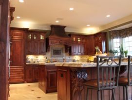Alder kitchen with great carvings and two islands