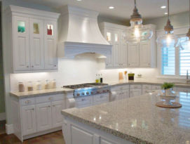 White kitchen with beautiful hood