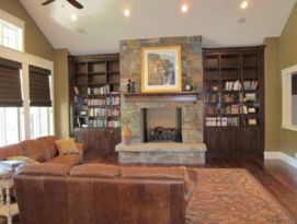 Built in book cases surround fire place