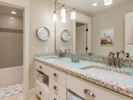Jack & Jill Bath with glass and tile countertop