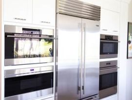 White cabinets with stainless appliances