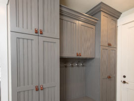 gray cabinetry in mud room