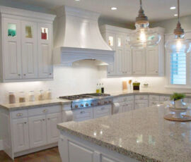 White kitchen with beautiful hood