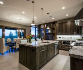 Gray kitchen with stainless appliances
