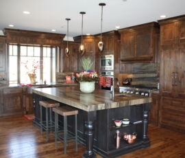 Wood kitchen with black island