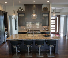Wood kitchen with custom hood.