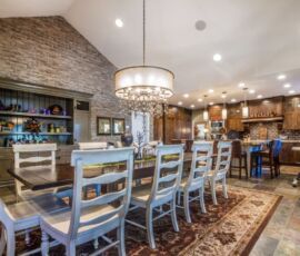 White and dark wood combo in this kitchen and dining room