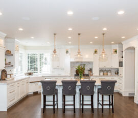 white kitchen with floating wood shelves
