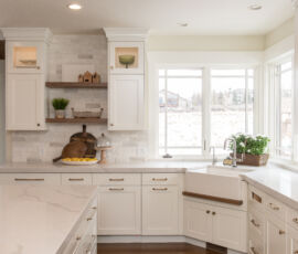 white kitchen with floating wood shelves